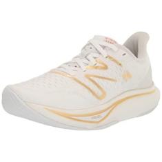 Imagem de New Balance FuelCell Rebel V3 Tênis de corrida feminino, Branco/dourado metálico/dourado claro metálico, 34
