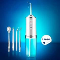 Imagem de Higienizador Bucal Bivolt Para Limpeza Profunda Dos Dentes - Irrigador