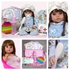 Imagem de Boneca Emilia Reborn Realista Roupa Azul Bolsa Com Acessórios - Cegonh