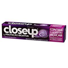 Imagem de Creme Dental Menta Refrescante com Flúor Closeup Proteção Bioativa Contra o Ácido do Açúcar Caixa 70g, Close Up