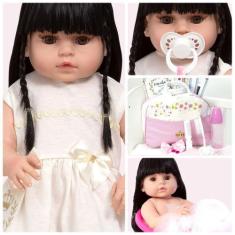 Imagem de Boneca Reborn Barata Morena Vestido Bege Bolsa Maternidade - Cegonha R