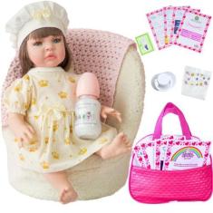 Imagem de Boneca Bebê Reborn Realista Silicone Vestido Dourado Bolsa de Maternid