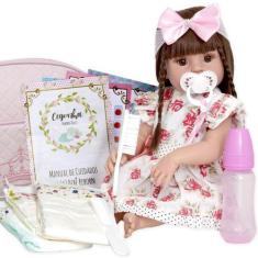 Imagem de Boneca Bebe Reborn Silicone Vestido Florido Com Vários Itens - Cegonha