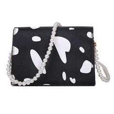 Imagem de Bolsa tiracolo com alça de pérola e estampa de vaca, Preto