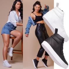 Imagem de Conjunto de Tenis femininos estilo esporte em branco e preto para uma combinação versátil.