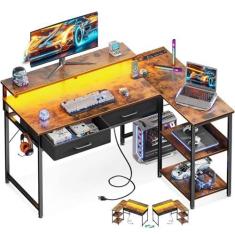 Imagem de Coleshome Mesa de jogos em forma de L de 101 cm com 2 gavetas e prateleiras de armazenamento, mesa de computador com portas USB, mesa de estudo para quarto, mesa de laptop moderna simples para
