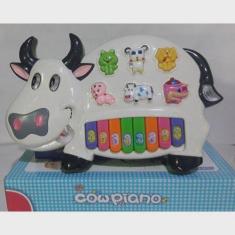 Imagem de Piano Teclado Musical Infantil Com Som E Luz Modelo Vaquinha E Muito D
