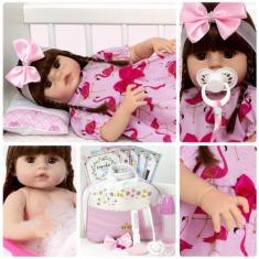 Imagem de Boneca Reborn Realista Menina Cabelo Castanho 20 Itens Bolsa - Cegonha