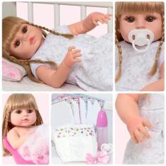 Imagem de Boneca Reborn Realista Loira Kit 13 Acessórios Pode Banho