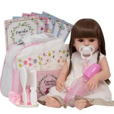 Boneca Tipo Reborn Gatinha Vestido Bege Com Vários Itens - Cegonha Reb