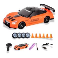 Carro Controle Remoto Drift 4x4 Recarregável com Rodas Extras – Alta Velocidade, Manobras Radicais, Faróis LED, Brinquedo Incrível para Crianças, Estilo Esportivo, Pronto para Correr