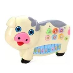 Teclado Infantil Brinquedo Porquinho Bebê Com Luzes Música. - toy king