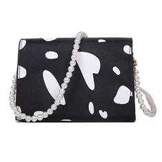 Bolsa tiracolo com alça de pérola e estampa de vaca, Preto