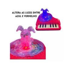 Brinquedo Mini Teclado Piano Musical Infantil Bate E Volta Luz E Som -