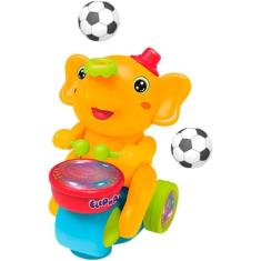 Brinquedo Infantil Elefante Musical Bate Volta Dança Anda Laranja