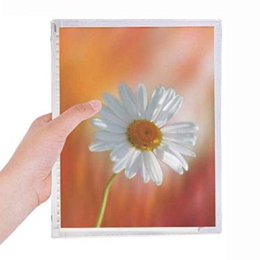 Imagem de Caderno laranja e branco escuro com lindas flores e folhas soltas para diário recarregável