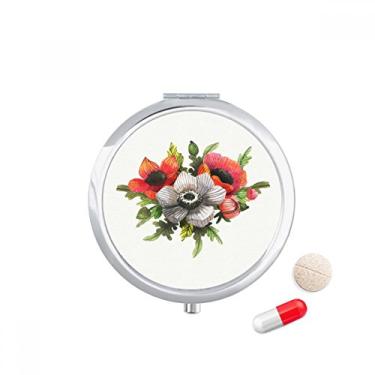Imagem de Caixa de armazenamento de medicamentos com flores para pintura de plantas e pílulas de milho