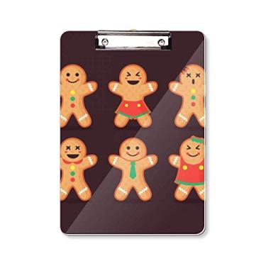 Imagem de Biscoito de gengibre masculino, prancheta de Natal, pasta, bloco de notas A4