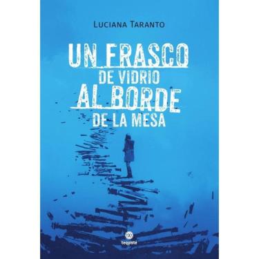 Imagem de Un frasco de vidrio al borde de la mesa - Espanhol