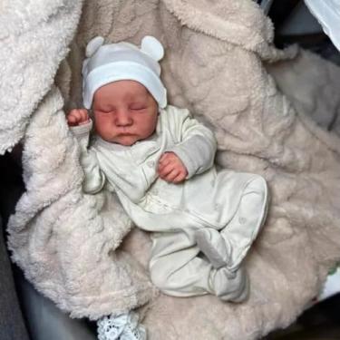 Imagem de Boneca Bebê Reborn Realista em Silicone 46 cm e Pode Dar Banho Acompanha Roupinhas Variadas e Acessórios (Livia)