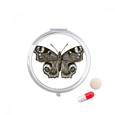 Imagem de Caixa de comprimidos de cor escura borboleta com asas escuras, caixa de armazenamento de medicamentos, dispensador de recipiente