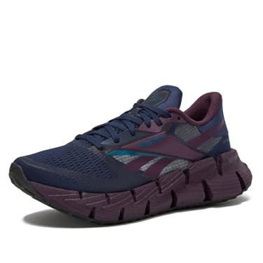 Imagem de Reebok Tênis de corrida feminino Floatzig, Vector azul marinho/ameixa/azul fuga, 36
