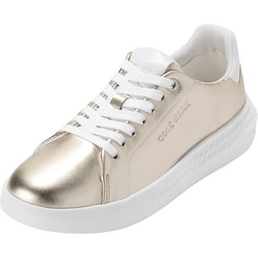 Imagem de Cole Haan Tênis feminino Grand Hurrion Cup com cadarço nos dedos, ouro/branco/branco, 35