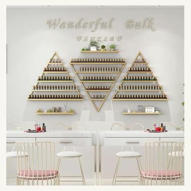 Imagem de ZDJZMGZ 6 conjuntos de suportes de armazenamento de esmalte de parede de metal, organizador de prateleiras de garrafas de óleo essencial, rack de exibição triangular para salão, loja e casa (ouro)