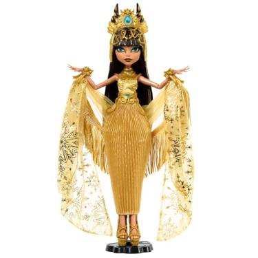 Imagem de Boneca Monster High Howliday, edição de inverno Cleo De Nile colecionável em vestido dourado com acessórios brilhantes e xale de franja cintilante, HXJ00