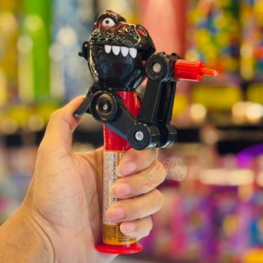 Imagem de Dinossauro Pirulito Dino Chomp Brinquedo Porta Pirulito Kids cor:melan