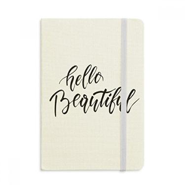 Imagem de Caderno de anotações escritas à mão com citação Hello Beautiful