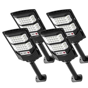 Imagem de JOISTOON Luzes de rua solares de 4 peças à prova d'água, luzes LED 6500K com sensor de movimento, holofotes solares com iluminação comercial do crepúsculo ao amanhecer remoto para caminho de quintal