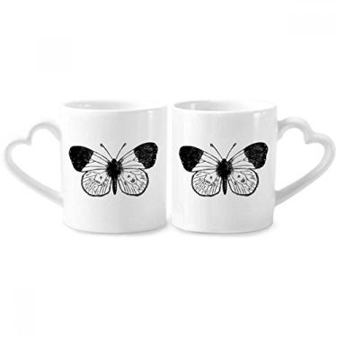 Imagem de Conjunto de canecas de porcelana para casais, espécimes de borboleta com asas brancas e alça de coração