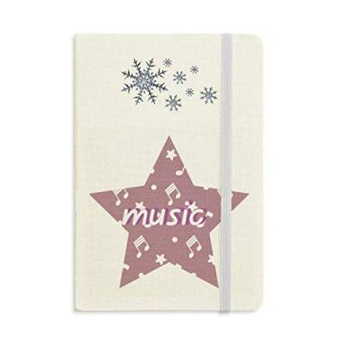 Imagem de Caderno de notas musicais com estrelas grandes roxas e flocos de neve para inverno