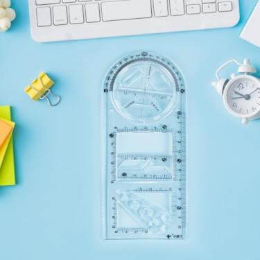 Imagem de Régua de desenho geométrico multiuso para estudantes - plástico transparente, 14 formas, transferidor e ferramentas de medição embutidas - leve e durável, 21,7 x 8,4 cm