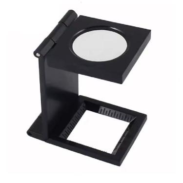 Imagem de Lupa Conta Fios 10x Mini De Mesa Bancada Suporte Dobravel Lente Optica 28mm Com Escala Portatil Bolso