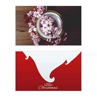 Imagem de Vaso de flor de ameixa rosa feriado, cartão de felicitações, mensagem de Natal