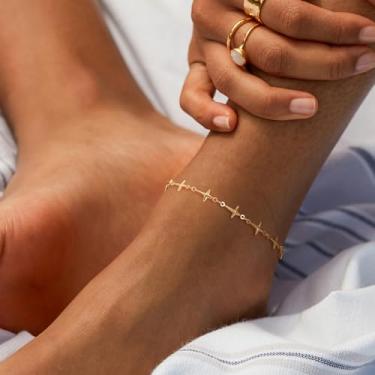 Imagem de Tornozeleira dourada feminina horizontal com cruz pontiaguda