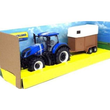 Imagem de Trator New Holland T7.315 Com Carreta De Animais Burago 1/32 - Bburago