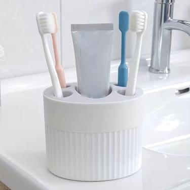 Imagem de Conjunto moderno de suporte de escova de dentes e pasta de dente de plástico com 4 compartimentos, organizador independente de escova de dentes para acessórios de banheiro, branco