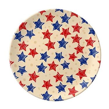 Imagem de Prato de porcelana decorativa com elementos do país de pentagrama azul vermelho e azul