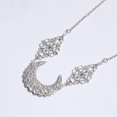 Imagem de Tiara feminina com estampa de flor de losango, lua vazada