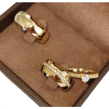 Imagem de Par aliança moeda antiga com forro de aço inox + solitário 7 mm