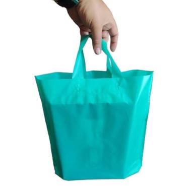 Imagem de Sacolas plásticas modelo alça fita, 15 micras de espessura alta densidade tratadas para impressão