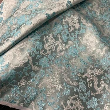 Imagem de Tecido brocado por jarda, 74 cm para bricolage, artesanato, brilho luxuoso, vestido de casamento drapeado leve e nítido, fantasias, moda, SE (tamanho: 1 m/39,3 polegadas, cor: 32 - dragão azul claro)
