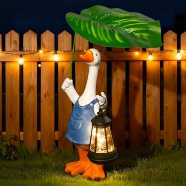 Imagem de WONDHOME Estátuas de ganso de alpendre, estátuas de jardim de ganso de cimento com folha, varanda frontal, gramado, jardim, decoração de arte, estatueta de pato com lanterna, aniversário, Natal