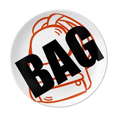 Imagem de Livros incluem prato de porcelana decorativa, para mesa e jantar