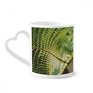 Imagem de Caneca de café de cerâmica copo de coração de vidro com foto de folhas
