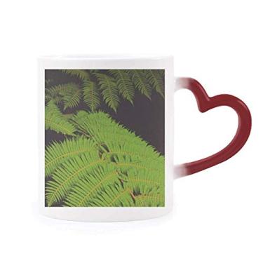 Imagem de Caneca de grés que muda de cor vermelha com imagem de planta verde
