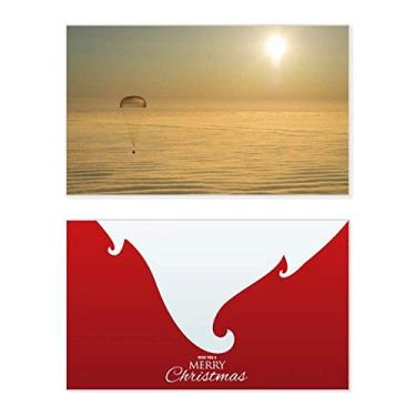 Imagem de Balão dourado brilhante de sol, feriado, comemorações, cartão de felicitações, mensagem de Natal